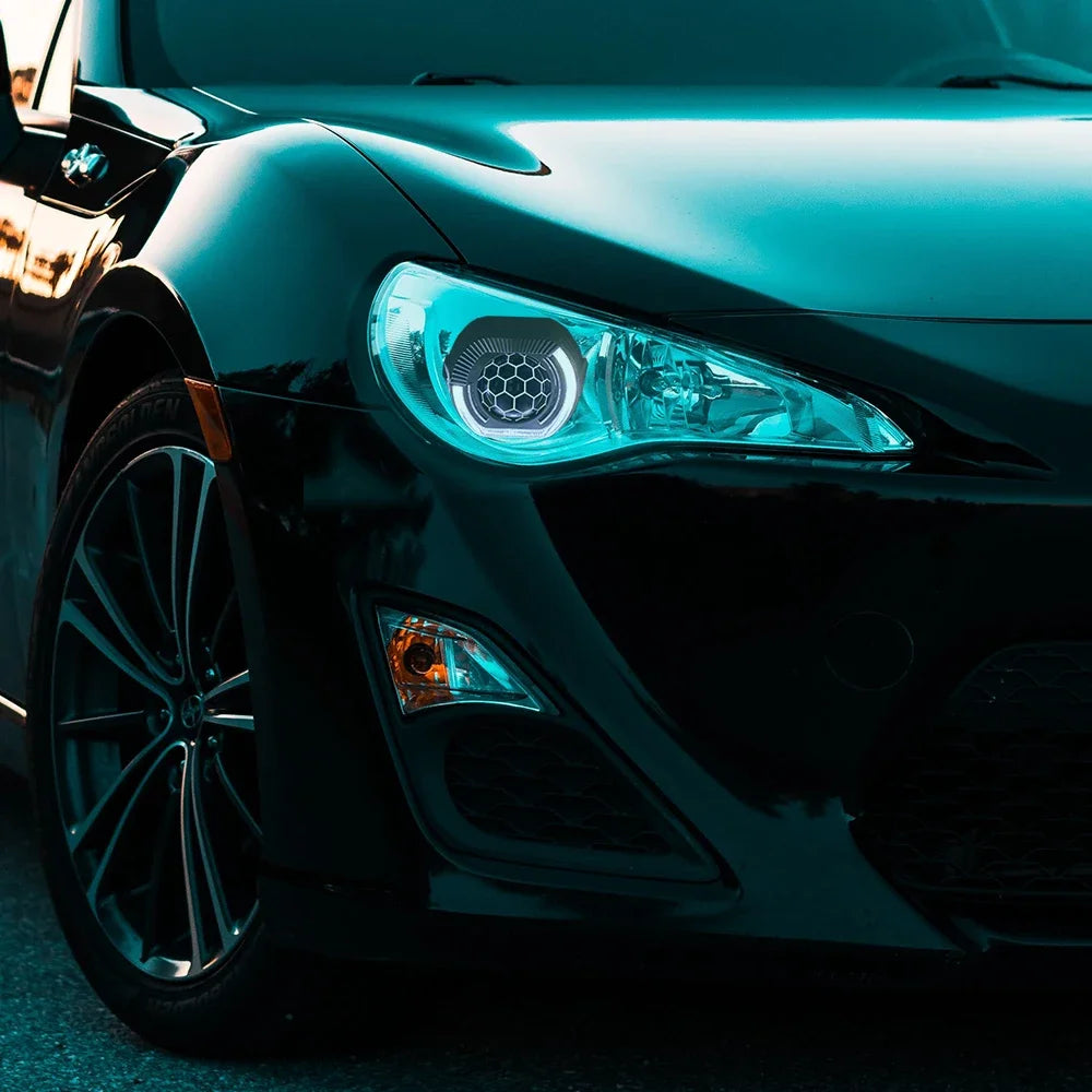 RGB Chasing Color Adjustable Frozen Angry Eye Shroud LED Projector H4 Headlight Retrofit Kits for Landcruiser